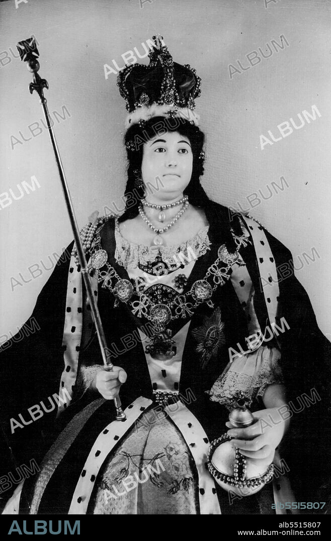 Queen Anne - In Wax - is Back In The Abbey -- Queen Anne, in Wax, holds orb and sceptre in her niche in the Norman Under croft of West Minster Abbey. Pictured today (Friday).Wax effigies of-figures faces in British history are to be seen once again in West Minster, Abbey, London, Charles II. :Elson, Queen Anne - three and other graves and brightly-bedecked figures - are in the Norman white croft of the Abbey. Located formerly in the Islip Chapel, they had been stored during the last war in secret pudding places. Figura, and garments (Which are Original).  have been preserved in preserved condition. May 11, 1951. (Photo by Reuterphoto).