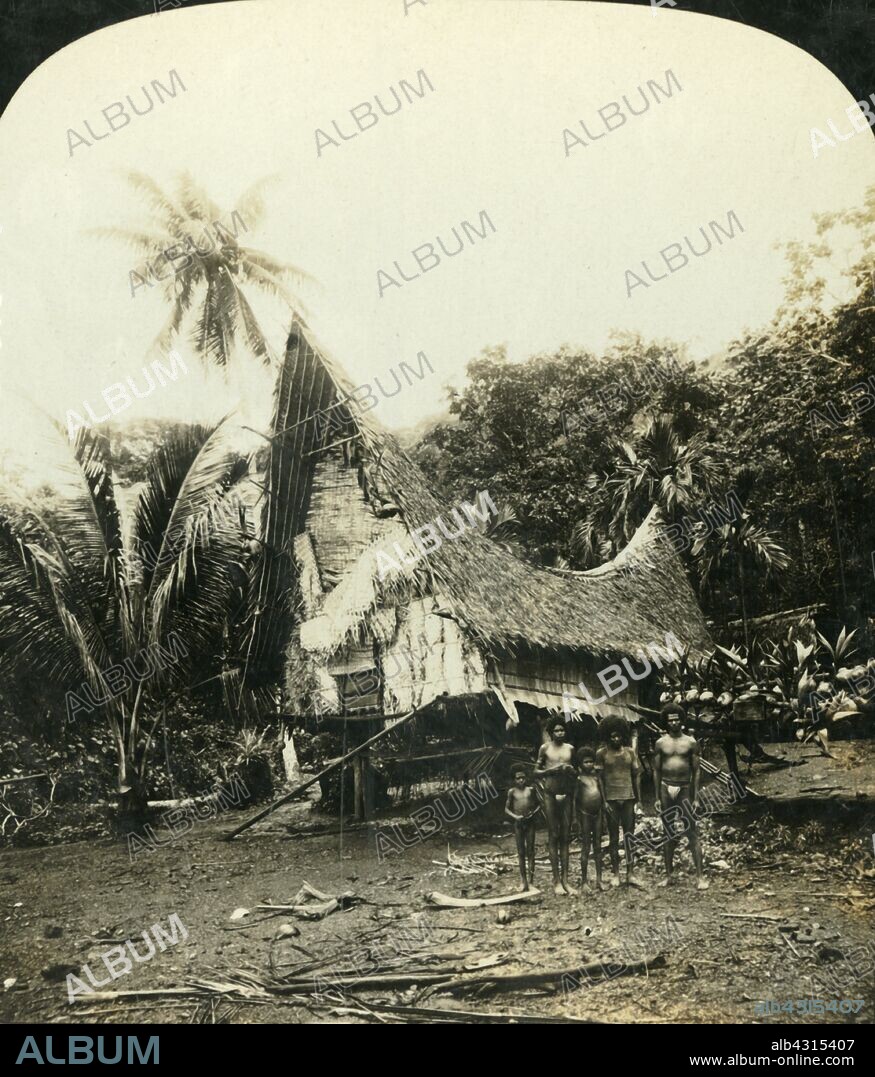 'A Native Hut, Sariba, British New Guinea', c1909. 'This style of building is peculiar to this particular island.' Traditional building with curved roof line on Saliba Island, in what is now Papua New Guinea. One of a set of stereocard views by George Rose, boxed as "Studies through the Stereoscope", to be viewed on a Sun Sculpture stereoscope made by Underwood & Underwood. [The Rose Stereograph Company, Melbourne, Sydney, Wellington & London, c1909].