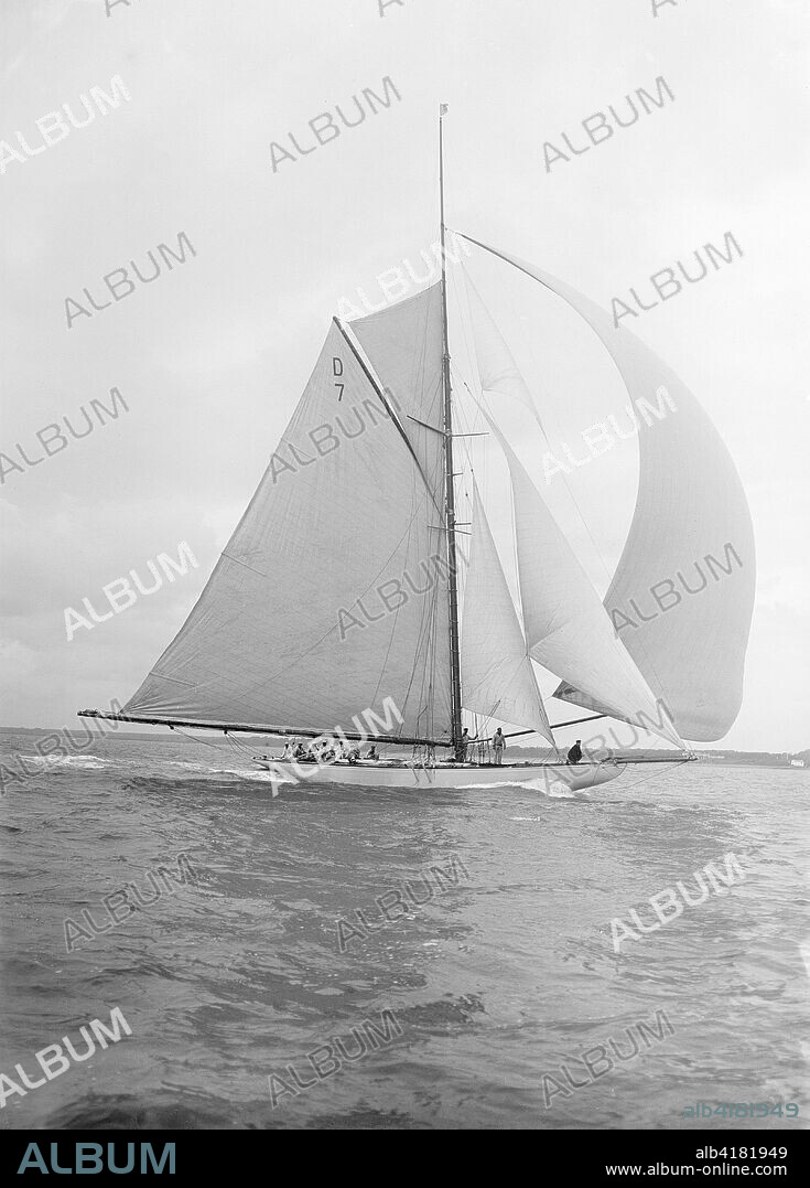 'Istria' sailing downwind under spinnaker, 1912.  'Istria', was designed by Charles Nicholson and originally owned by the architect Sir Charles Allom.