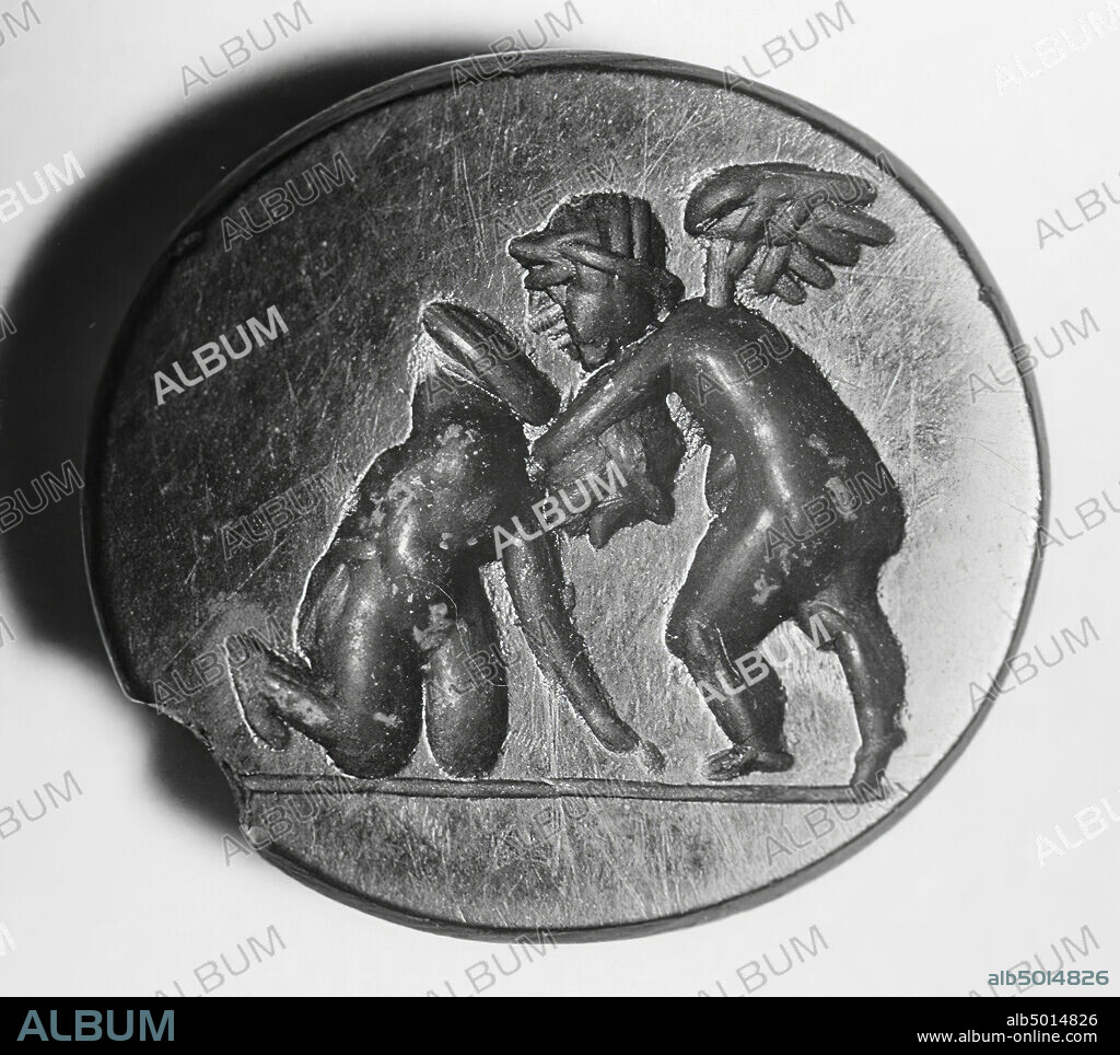 The kneeling figure to the left (to the left) is held by the winged Amor (right). With ground line, gem, intaglio, ringstone, stone, carnelian, Color: deep red, transparent, Shape: almost round, Machined: Maaskant-Kleibrink, M., Catalog of the engraved gems at the Royal Coin Cabinet, 1978, p.60 , fig.2, type F1, 2nd - 3rd century after Chr. 100-300 AD, Netherlands, Limburg, unknown, unknown.