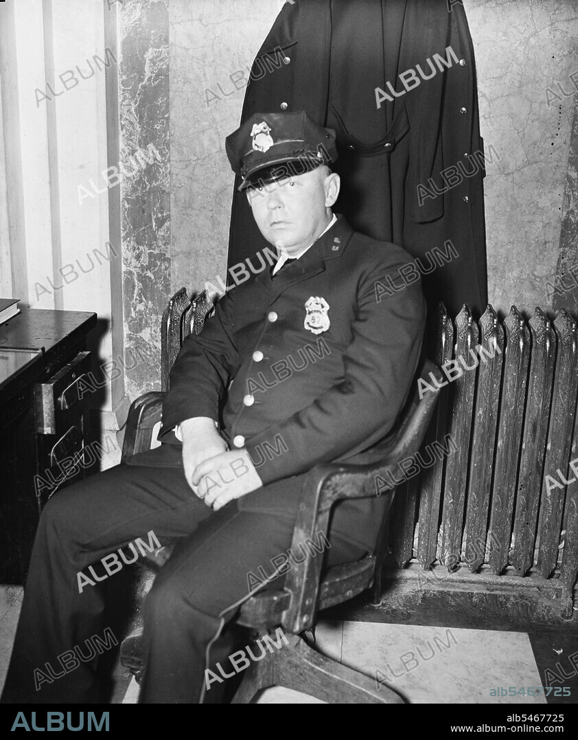 Fred. C. Parker, alleged life threatener of Sen. Huey Long, as he appeared at his post of duty in the House office building where he works as a member of the Capitol police force circa February 8, 1935.