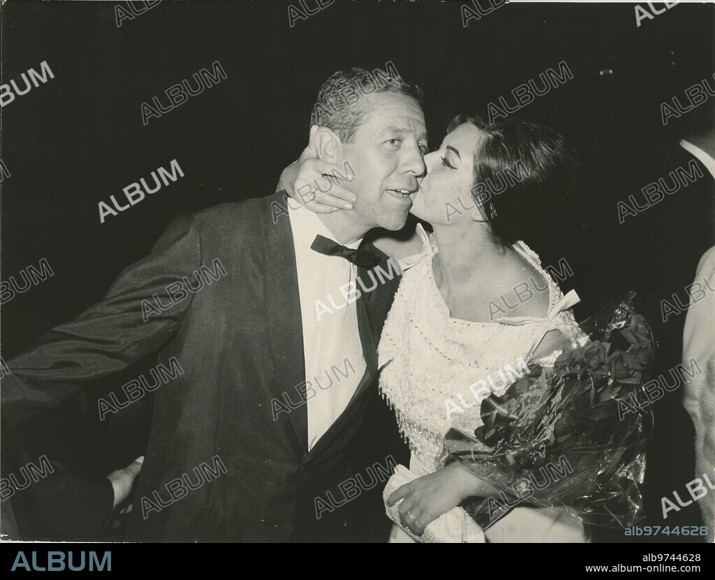 Venice (Italy), 1963. Emma Penella kisses Berlanga after the screening of "The Executioner" at the 1963 Venice Film Festival.