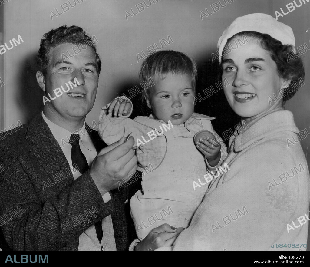 Peter Thompson. Star Golfer, Peter Thompson who arrived back in Sydney today by Qantas from San Francisco.With his wife and 15month daughter Deidre. August 19, 1955. (Photo by George Lipman/Fairfax Media).