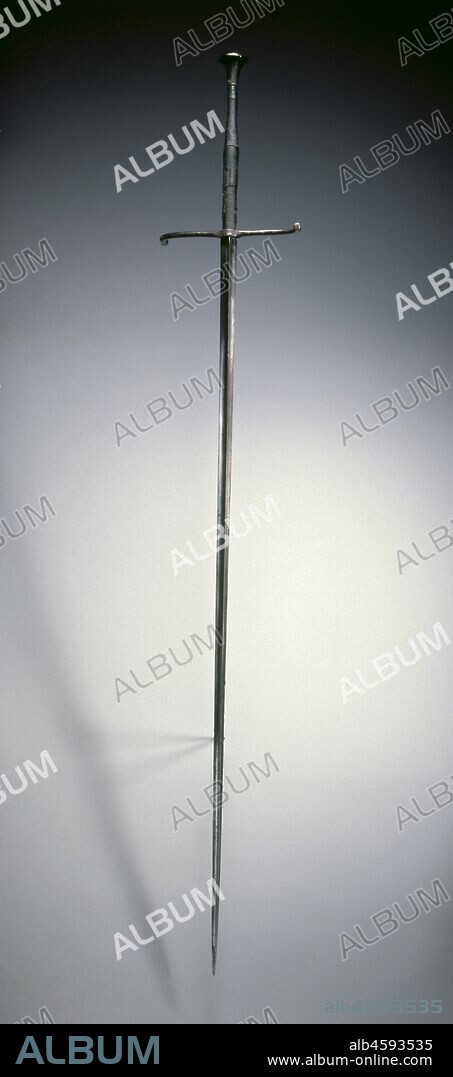 Estoc, early 1500s. The French word  estoc  means "thrust" and therefore was adopted as the name for this long thrusting sword. It has a fairly long grip and simple cross-shaped hilt. The rigid blade, designed for thrusting at armored opponents, is three-sided for strength. The estoc was sometimes carried from the saddle. From the early 1300s, it was used by cavalrymen as an auxiliary side arm when a horseman had dismounted.