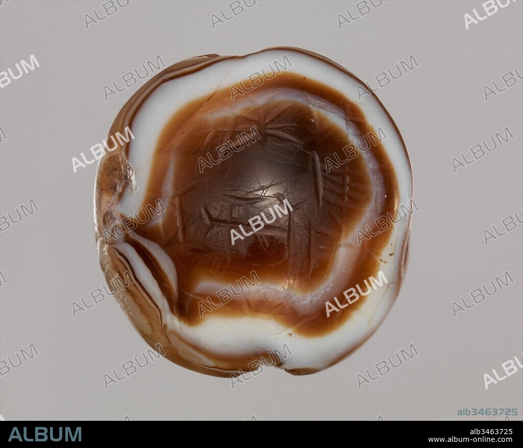 Bead with cuneiform inscription of Kurigalzu I or II, Kassite, ca. 14th century B.C., Mesopotamia, Kassite, Agate, H. 2.5 cm x W. 2.4 cm x Th. 1.3 cm, Stone-Ornaments-Inscribed, Eye-like beads and stones, made from naturally occurring agate formations, are found throughout Mesopotamian history. At least by the end of the third millennium B.C., rulers began carving short inscriptions on these stones, dedicating them to the gods.