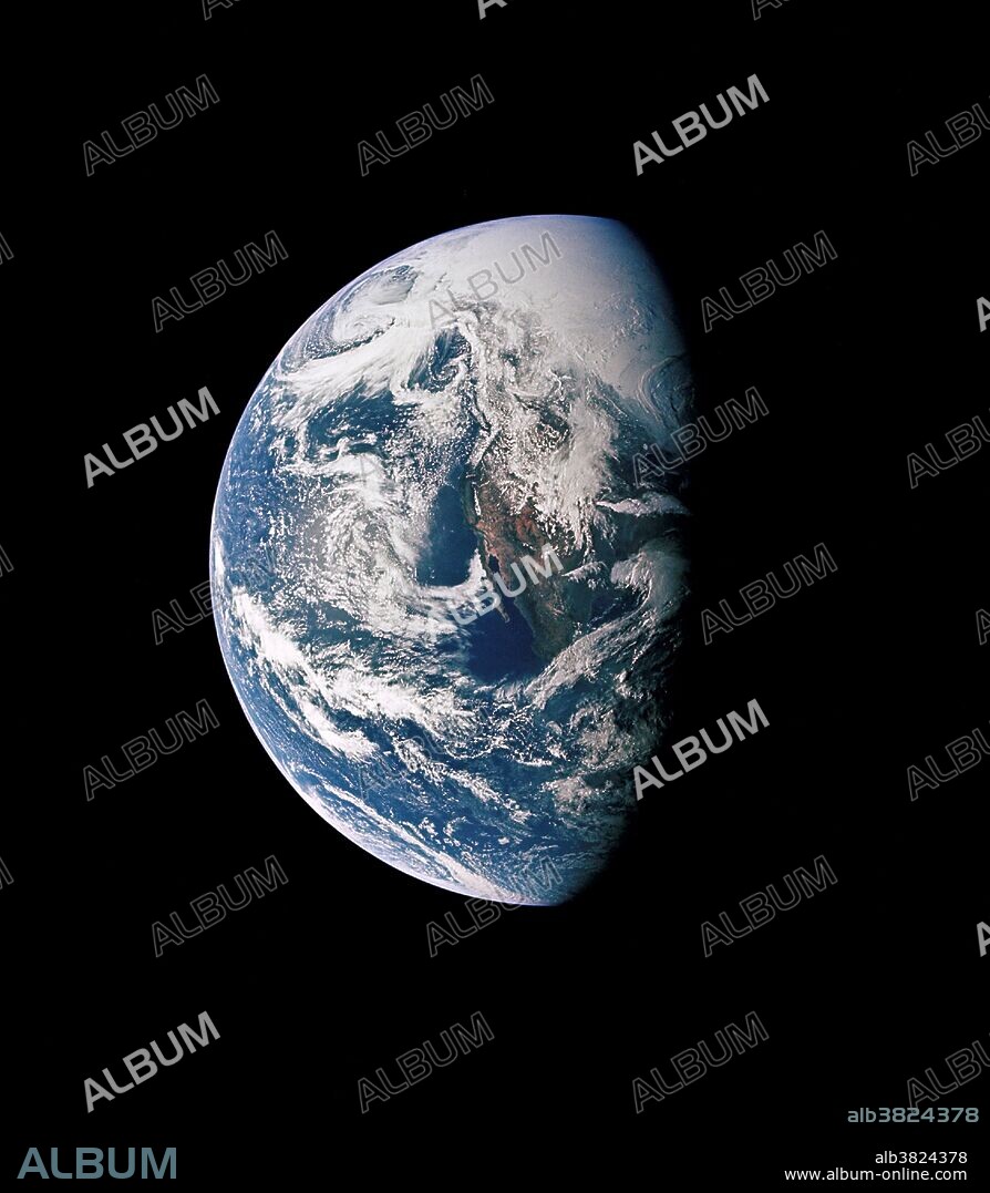 This photograph of Earth was taken from NASA's Apollo 13 spacecraft during its trans-Earth journey home. The most visible land mass includes southwestern United States and northwestern Mexico. The peninsula of Baja California is clearly seen. Most of the land area is under heavy cloud cover. The Apollo 13 crew consisted of astronauts James A. Lovell, Jr., commander; John L. Swigert Jr., command module pilot; and Fred W. Haise Jr., lunar module pilot.