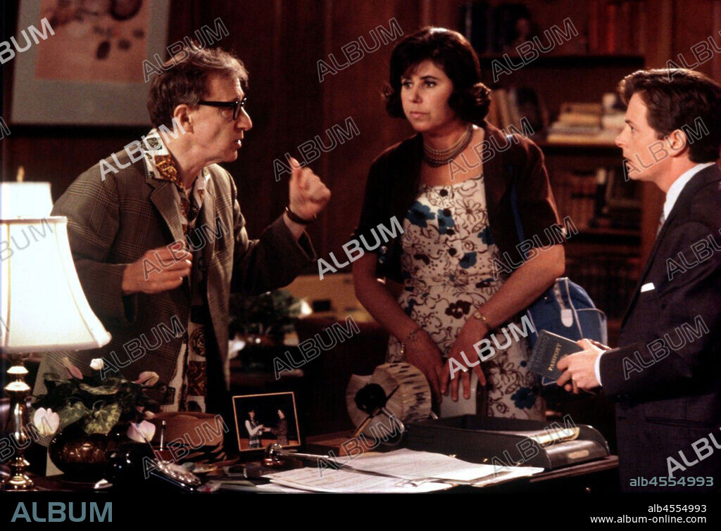 JULIE KAVNER, MICHAEL J. FOX and WOODY ALLEN in DON'T DRINK THE WATER, 1994, directed by WOODY ALLEN. Copyright BUENA VISTA HOME VIEDO.