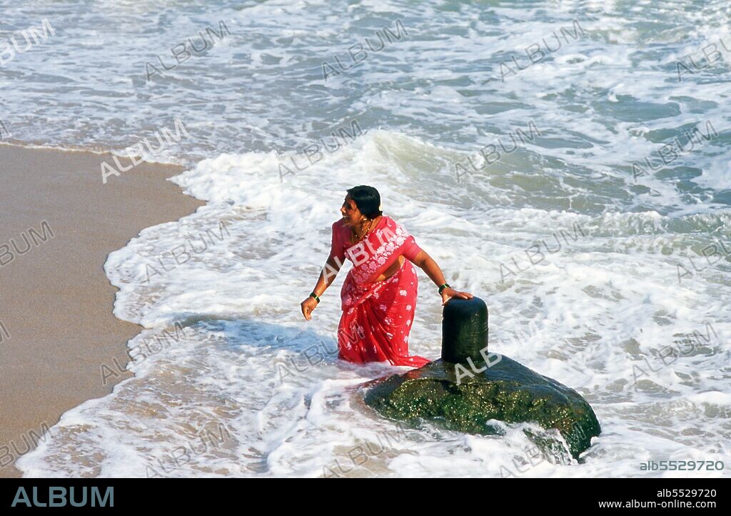 Kanyakumari, formerly known as Cape Comorin, lies at the southernmost point of mainland India. It is the southern tip of the Cardamom Hills, an extension of the Western Ghats which range along the west coast of India. Kanyakumari takes its name from the goddess Devi Kanya Kumari, considered to be a sister of Krishna. Women pray to her for marriage. The goddess is believed to be the one who removes the rigidity of our mind. The temple here is a Shakti Peetha, one of the holiest shrines of the Mother goddess.