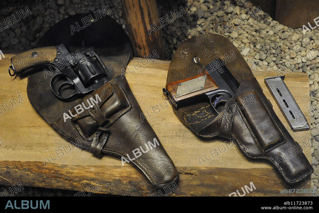 From left to right: holster and revolver Nagant M1895 belonging to Major G. Brozina; holster and Mauser Model 1910 pistol, a gift to the Latvian-born Soviet Major General Roberts Varkalns (1899-1959). Latvian War Museum. Riga. Latvia.