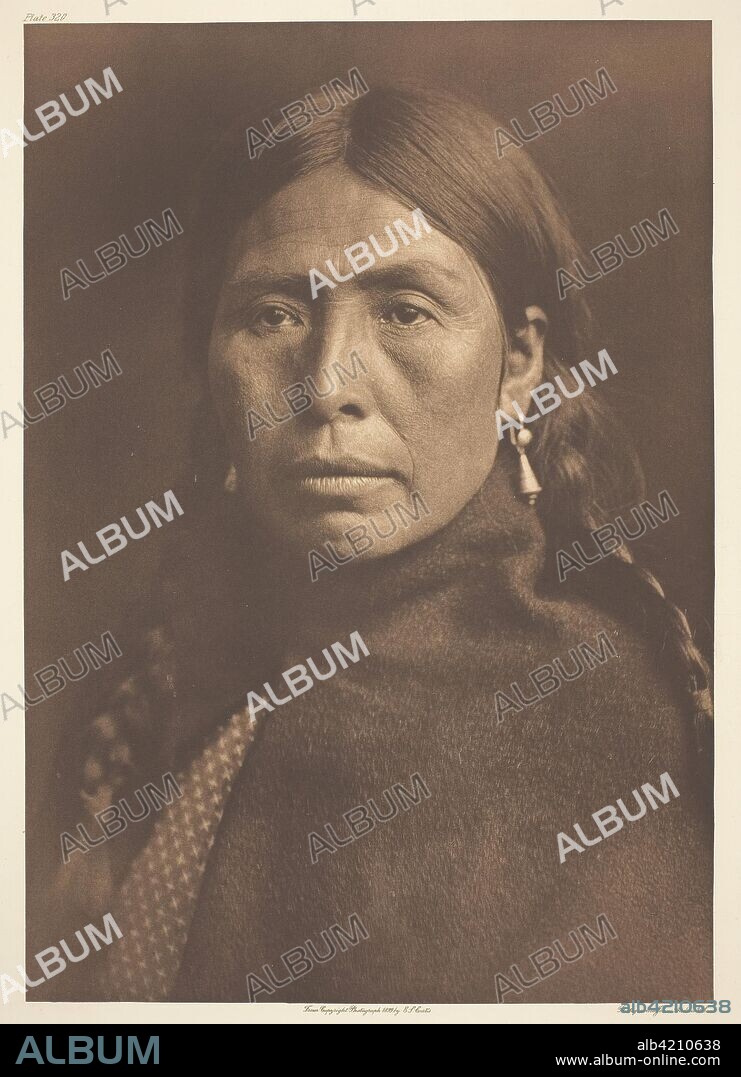 Lummi Type. Edward S. Curtis; American, 1868-1952. Date: 1899. Dimensions: 37.4 x 26.3 cm (image/paper); 56.2 x 46.2 cm (mount). Photogravure, plate 320 from "The North American Indian, Volume 9" (1913). Origin: United States.