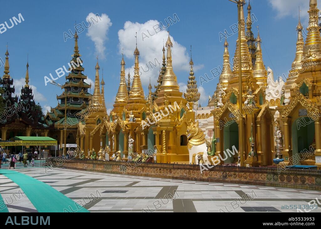 The golden stupa of the Shwedagon Pagoda rises almost 100 m (330ft) above its setting on Singuttara Hill and is plated with 8,688 solid-gold slabs. This central stupa is surrounded by more than 100 other buildings, including smaller stupas and pavilions. The pagoda was already well established when Bagan dominated Burma in the 11th century. Queen Shinsawbu, who ruled in the 15th century, is believed to have given the pagoda its present shape. She also built the terraces and walls around the stupa. The giant stupa has a circumference at platform level of 433 m (1,420ft), with its octagonal base ringed by 64 smaller stupas.
