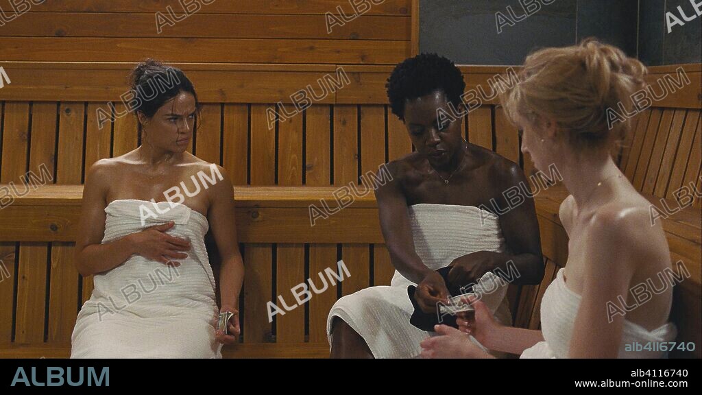 ELIZABETH DEBICKI, MICHELLE RODRIGUEZ and VIOLA DAVIS in WIDOWS, 2018, directed by STEVE MCQUEEN. Copyright 20th Century Fox / New Regency Pictures / See-Saw Films.