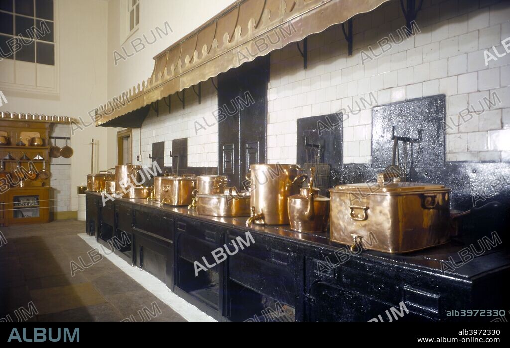 The Great Kitchen, Royal Pavilion, Brighton, East Sussex, 1960s. The Pavilion was originally built in 1786-1787 by Henry Holland for King George IV (1762-1830), then Prince Regent. It was added to by William Porden in 1804-1806 and remodelled by John Nash between 1815 and 1822 in a European interpretation of Indian and Chinese architectural styles.