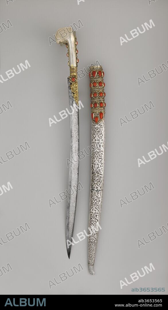 Yatagan with Scabbard. Culture: Anatolian or Balkan. Dimensions: L. with scabbard 31 1/8 in. (79 cm); L. without scabbard 29 in. (73.7 cm); L. of blade 23 1/8 in. (58.7 cm); W. 2 1/4 in. (5.7 cm); Wt. 1 lb. 14 oz. (850 g); Wt. of scabbard 1 lb. 10 oz. (737.1 g). Date: dated 1802-3.
The yatagan was popular throughout the Ottoman Empire. It is distinguished by a single-edged blade that curves slightly inward and by a hilt with no guard and two flared wings at the pommel.