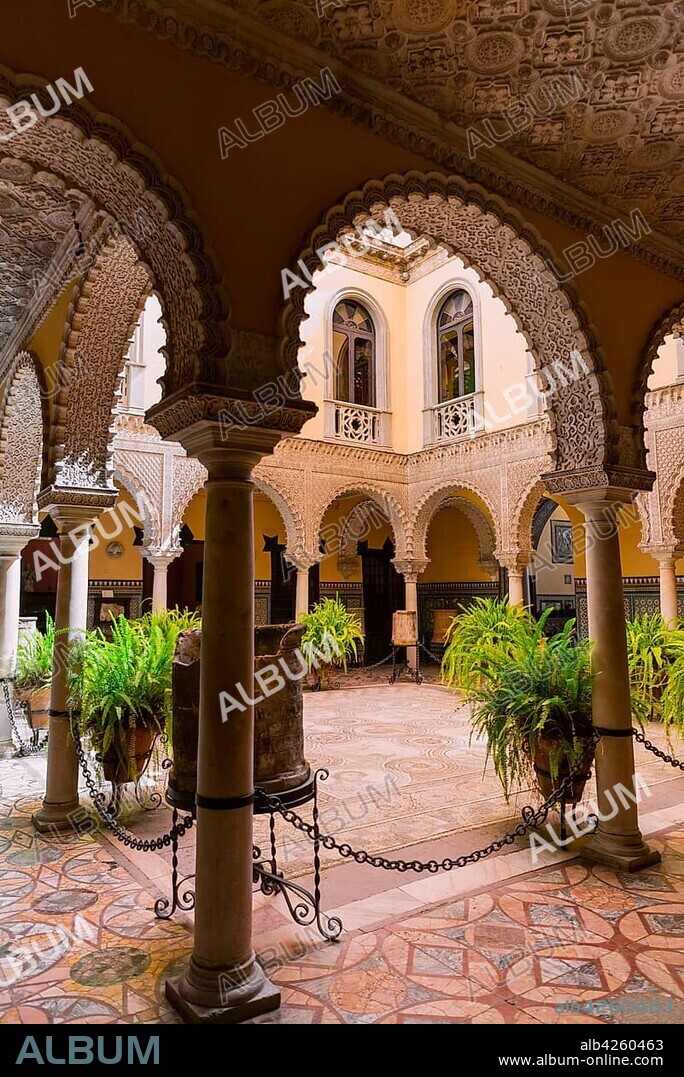 16th century palace with Arabian architecture, courtyard with artistic arcade and Roman mosaic, Palacio de la Condesa de Lebrija, Seville, Andalusia, Spain