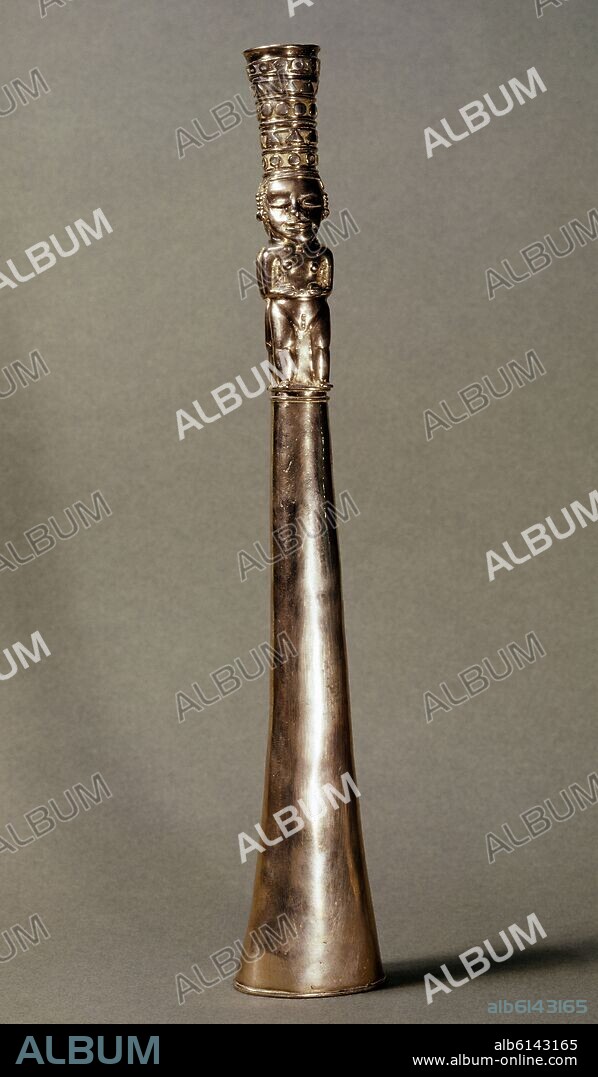 TESORO DE LOS QUIMBAYAS - TROMPETA DE ORO CON FIGURA MASCULINA - COLOMBIA - 200-1000 DC.