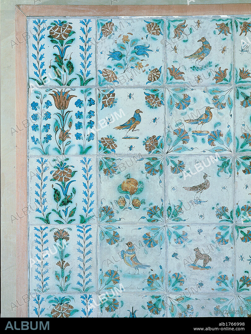 Majolica floor of the Giunta Albertiana in the Castello del Buonconsiglio, by Unknown Artist, 1688, 17th Century,. Italy, Trentino Alto Adige, Trento, Trento, Castello del Buon Consiglio. Detail majolica tile floor floral decoration flowers carnations birds modularity decoration colours yellow blue red green.