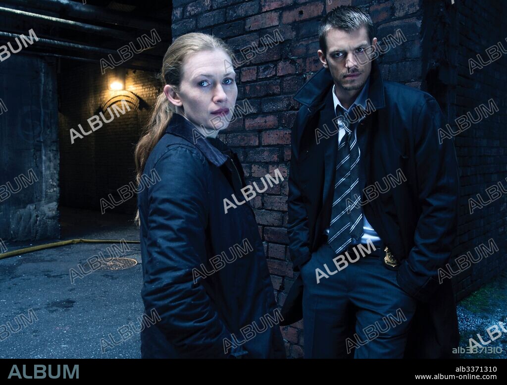 JOEL KINNAMAN and MIREILLE ENOS in THE KILLING, 2011, directed by VEENA SUD. Copyright FOX TELEVISION STUDIOS.