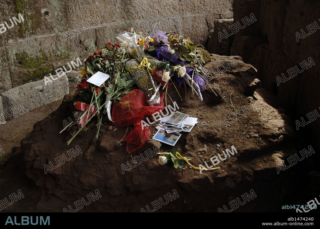 Italy. Rome. Altar who commemorates the place where Julius Caesar was cremated at the Temple of the Divine Julius. Flowers. Detail.