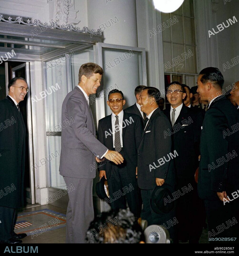 US President John Kennedy greets General Park Chung-Hee (to the right of President Kennedy), Chairman of the Supreme Council for National Reconstruction of the Republic of Korea, and the members of General Park's official party for a luncheon in honor of General Park. Clement Conger, a protocol officer for the State Department, is on the far left, and Korean Ambassador to the United States Il Kwon Chung is second from the right, White House, Washington, D.C.