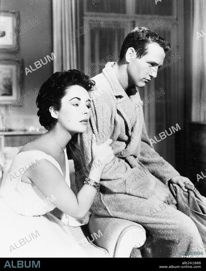 ELIZABETH TAYLOR and PAUL NEWMAN in CAT ON A HOT TIN ROOF, 1958, directed by RICHARD BROOKS. Copyright M.G.M.