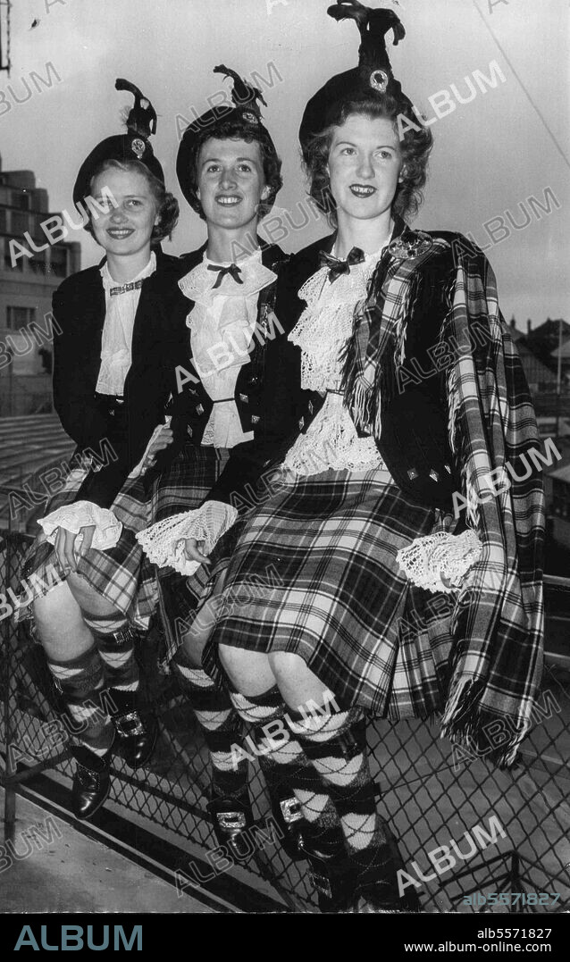 ***** Scottish lassies ***** part in the Best-Dressed Lassies' competition at the Highland Gathering at the Showground today. They are (left to right): Diana Saunderson, 19, of Arncliffe, Vivian Pightling, 19, of Banksia, and Beryle Preston, 19, of Carlton. January 1, 1954.