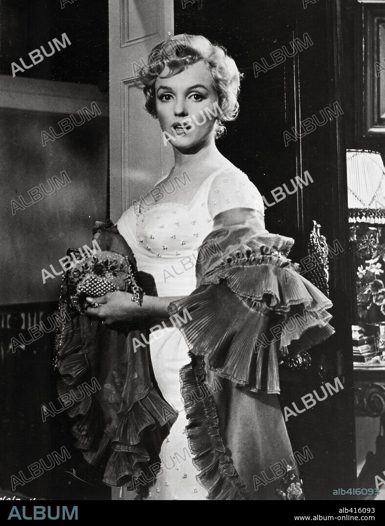 NORMA JEAN BAKER. MARILYN MONROE in THE PRINCE AND THE SHOWGIRL, 1957, directed by LAURENCE OLIVIER. Copyright WARNER BROTHERS.