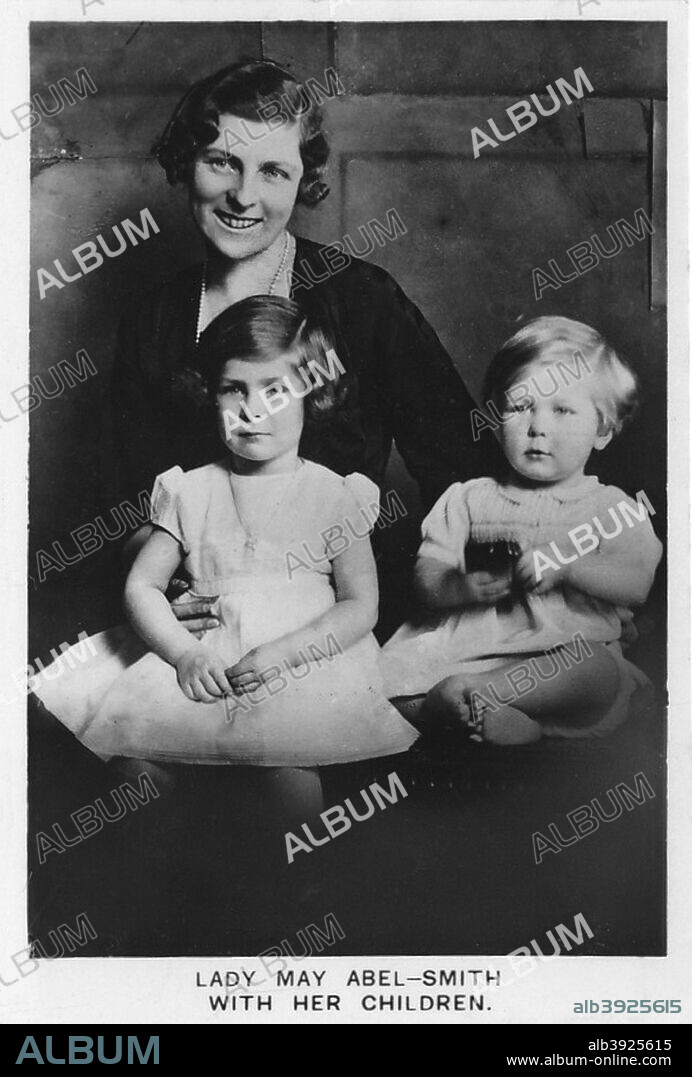 Lady May Abel-Smith with her Children, 1937. Lady May (Helen Emma) Abel Smith, born Princess May of Teck, (1906-1994) was a great-granddaughter of Queen Victoria, as well as a great-great-great-granddaughter of King George III and niece to Queen Mary, consort of King George V. She was also related on her mother's side to the royal family of the Netherlands. Card No 22 of 48 from Coronation Souvenir cigarette cards produced for Tournament Cigarettes. [RJ Lea Ltd, Manchester, 1937].
