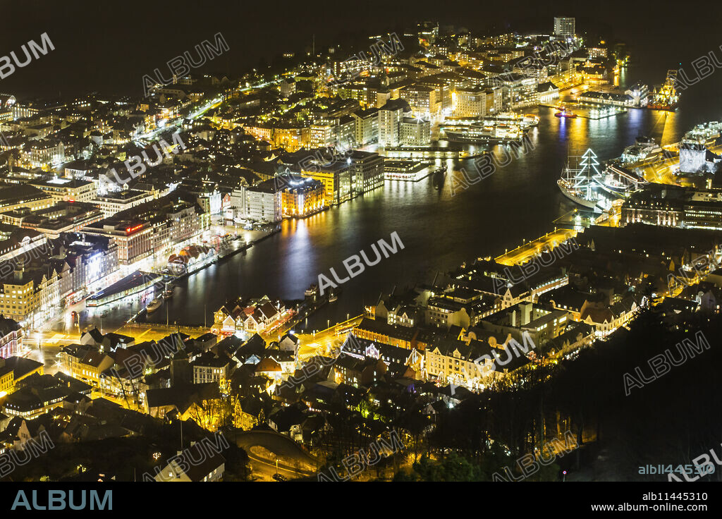 Night view of the city, Vagen Harbour and Puddefjord from the Mount Floyen funicular (Floibanen) station. Bergen, Hordaland, Norway, Scandinavia, Europe.