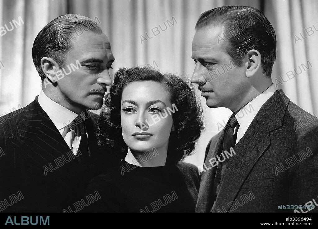 CONRAD VEIDT, JOAN CRAWFORD and MELVYN DOUGLAS in A WOMAN'S FACE, 1941, directed by GEORGE CUKOR. Copyright M.G.M.
