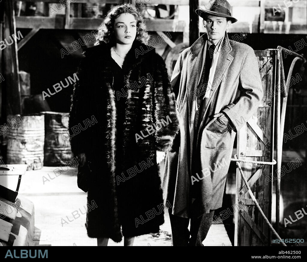 ROBERT DUKE and SIMONE SIGNORET in GUNMAN IN THE STREETS, 1950, directed by FRANK TUTTLE. Copyright FILMS SACHA GORDINE.