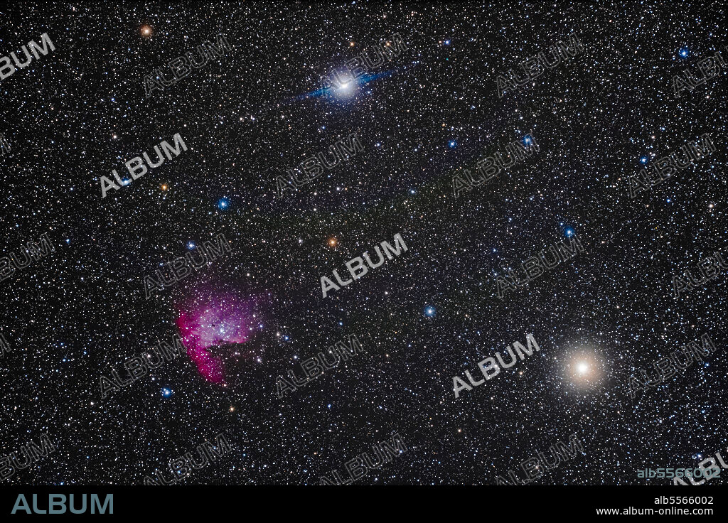 NGC 281, aka the Pacman Nebula, in Cassiopeia, near the stars Achird (top) and Schedar (right). High haze added the star glows naturally.