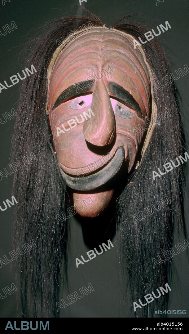 North American Indian artifact, belonging to an Iroquois society known as the 'False-Face Band' in which each member had to have seen such a face in a dream. It was used to cure diseases.
