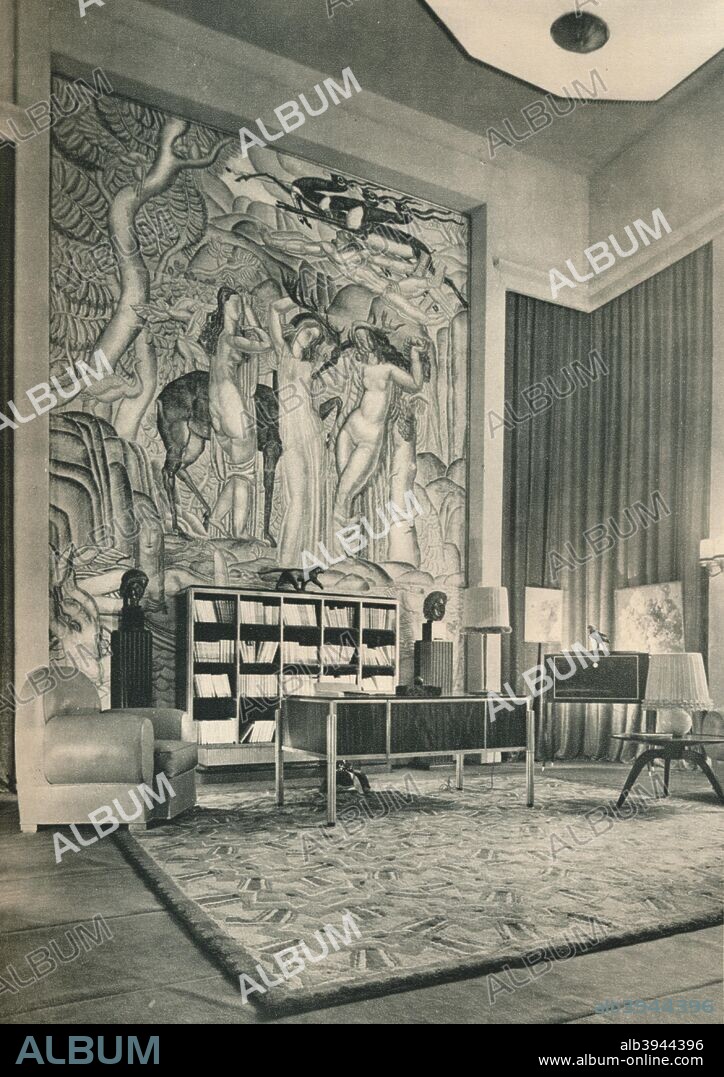 JEAN THÉODORE DUPAS. 'A Collector's Study', c1925. Arranged and Furnished by Émile-Jacques Ruhlmann (1879-1933), mural painted by Jean Théodore Dupas (1882-1964), carpet by Fontaine.  From The Studio Volume 92. [London Offices of the Studio, London, 1926].