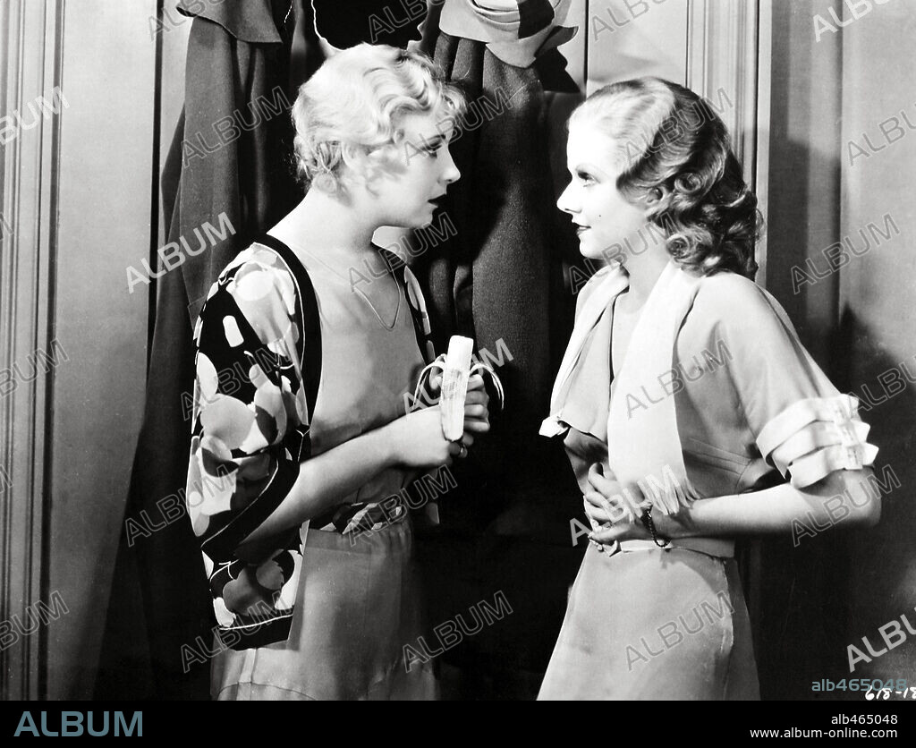 JEAN HARLOW and UNA MERKEL in RED-HEADED WOMAN, 1932, directed by JACK CONWAY. Copyright METRO GOLDWYN MAYER.