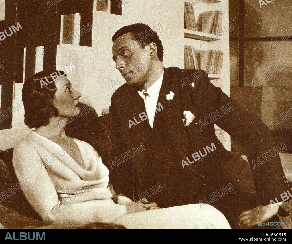 'Louis JOUVET(1887-1951) et Valentine TESSIER dans domino a la comedie des champs elysees' Photographie du 10 fevrier 1932 (XXeme s., 20eme s., 20e s.) Credit Collection KHARBINE-TAPABOR.