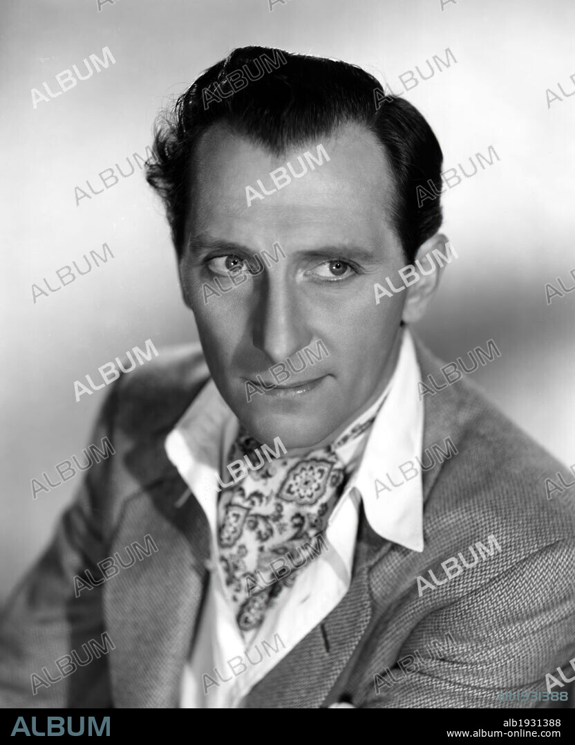 PETER CUSHING in THE END OF THE AFFAIR, 1955, directed by EDWARD DMYTRYK. Copyright COLUMBIA PICTURES.