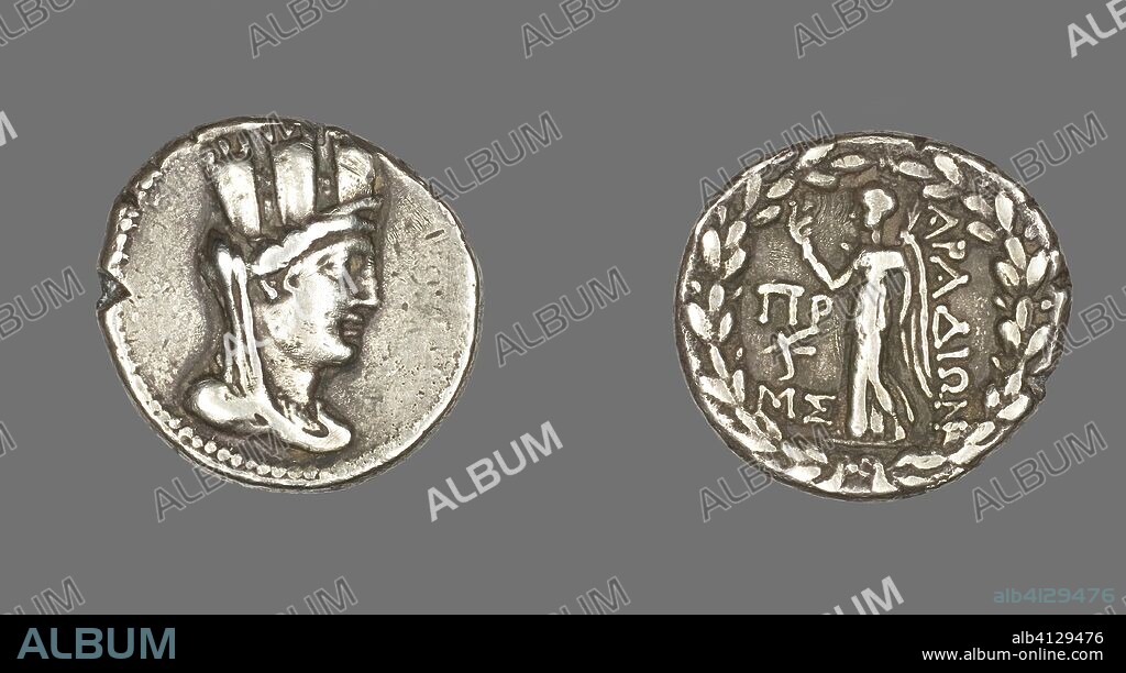 ANCIENT GREEK. Tetradrachm (Coin) Depicting the Goddess Tyche. Greco-Roman; Arados, Phoenicia. Date: 80 BC-79 BC. Dimensions: Diam. 2.8 cm; 13.49 g. Silver. Origin: Aradus.