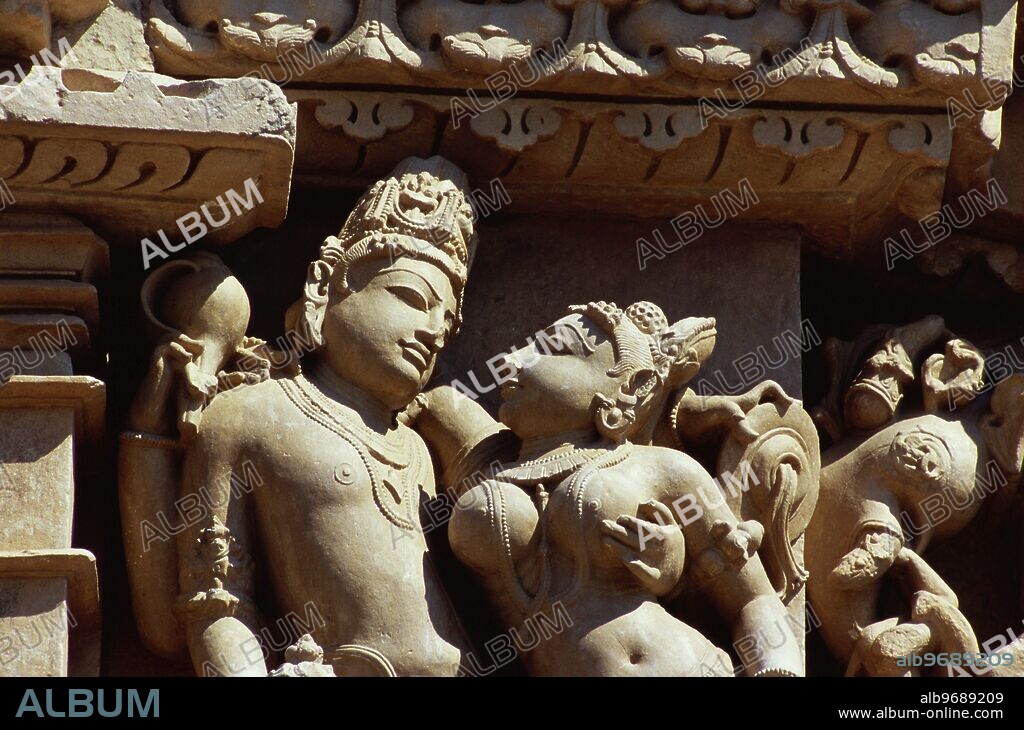 Lord Vishnu with consort Lakshmi on Parasvanath temple - Khajuraho - Madhya Pradesh - India.