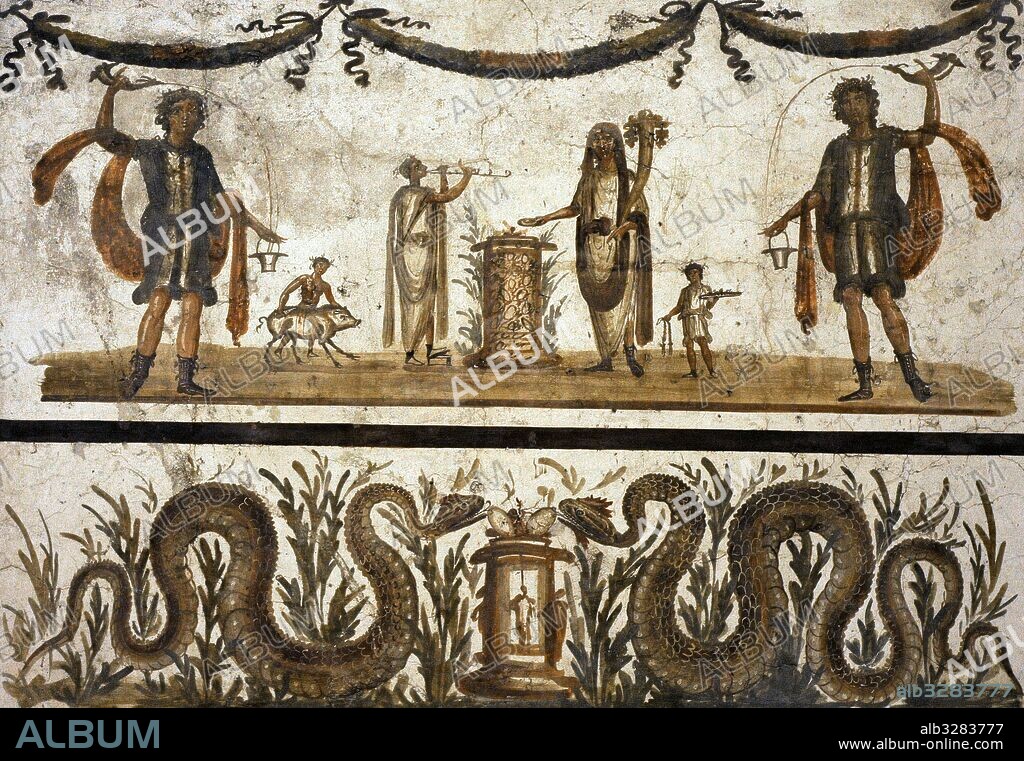 Culto doméstico a los dioses. Lararium romano. Detalle del fresco con lares, genio, flautista y el sacrificador, que sostiene un rhytium (cuerno para beber) en la mano, mientras coloca con la otra la ofrenda en el fuego sagrado. Cuarto Estilo. 69-79 d. C. Insula VII, 6, 3, Pompeya. Museo Arqueológico Nacional. Nápoles. Italia.