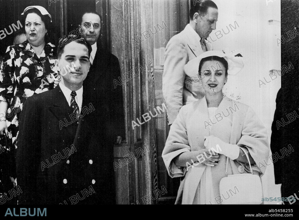 The King And Queen Of Jordan On The Riviera. -- King Hussein of Jordan with Queen Dina leaving their Hotel at Nice where they made a short stay on their way from Amman to Spain for a three week visit as the guests of General Franco. June 08, 1955. (Photo by Sport and General Press Agency Limited).