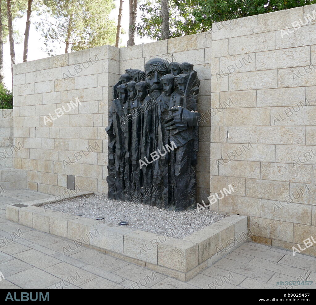 Janusz Korczak & the Children of the Ghetto,' Janusz Korczak Square, Yad Vashem Holocaust Memorial, Jerusalem (Israel). Sculpture by Boris Saktsier, depicts the Polish-Jewish educator Dr. Henrik Goldschmidt [1878-1942] (known by his pseudonym Janusz Korczak), as he stands in the center of a group of children and shelters them with his body and his outstretched, embracing arms. Janusz Korczak & the children of his orphanage were sent to the Treblinka death camp on August 5, 1942.