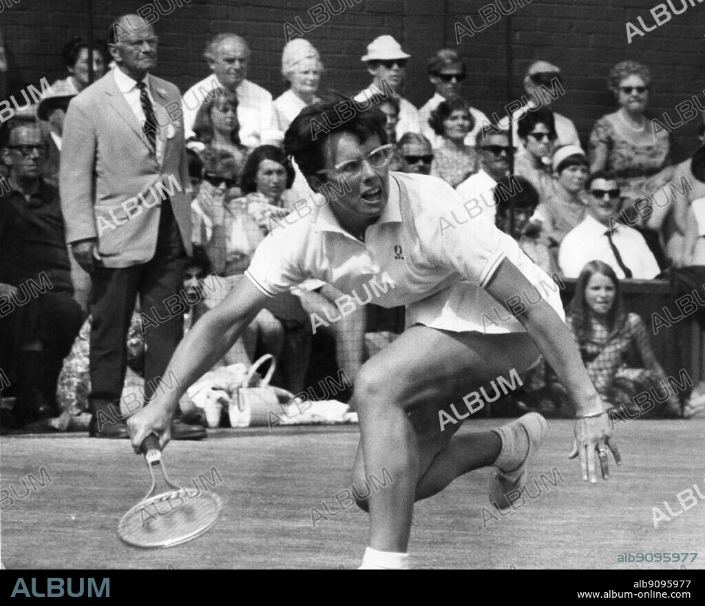 1968 Wimbledon Lawn Tennis Championships - Mrs. Billie Jean King of America watches the ball anxiously as she makes a return during her semi-finals match against Britain's Mrs. P. E. Jones on the centre court on 4th July 1968.. ©TopFoto.