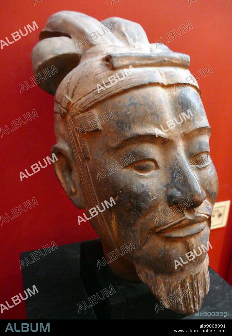 Reproduction of a figure from the Terracotta Army of soldier and horse, funerary statues, depicting the armies of Qin Shi Huang, the first Emperor of China. It is a form of funerary art buried with the emperor in 210-209 BCE and whose purpose was to protect the emperor in his afterlife. The figures, dating from approximately the late third century BCE, were discovered in 1974 by local farmers in Lintong District, Xi'an, Shaanxi province.