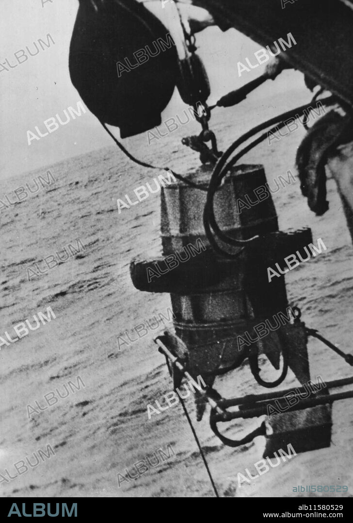 T.V. Camera In Comet Salvage Search -- The admiralty-designed casing made for enclosing the under water television camera.A series of pictures of television cameras and under water views made during the search by the Royal Navy for the Comet aircraft which crashed off Elba. During the operation which has been going on for eight weeks under the command of Admiral the Earl Mountbatten, about one tenth of the wreckage has been recovered. Experts are examining the parts brought to the surface in an effort to determine the cause of the plane crash. March 13, 1954. (Photo by British Official Photograph).