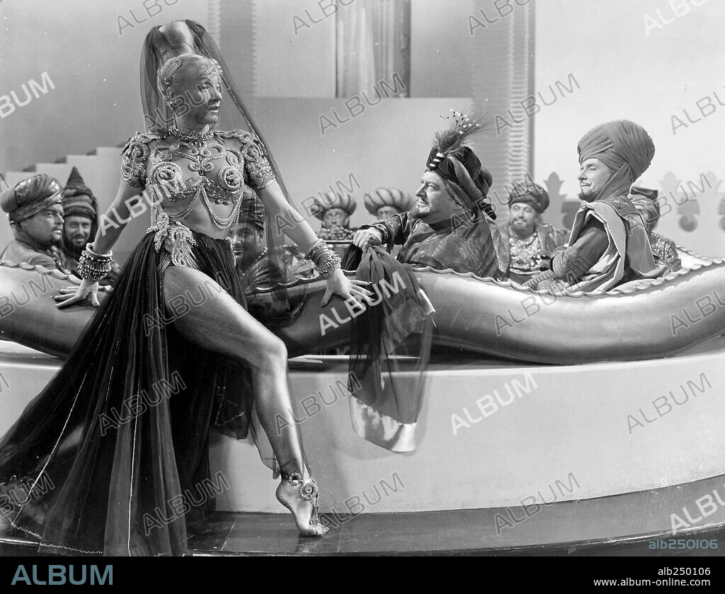 EDWARD ARNOLD, MARLENE DIETRICH and RONALD COLMAN in KISMET, 1944, directed by WILHELM DIETERLE. Copyright M.G.M.