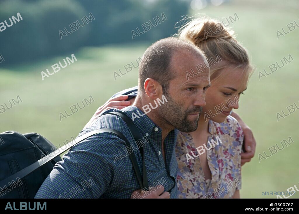 JASON STATHAM and YVONNE STRAHOVSKI in KILLER ELITE, 2011, directed by GARY MCKENDRY. Copyright OMNILAB MEDIA.