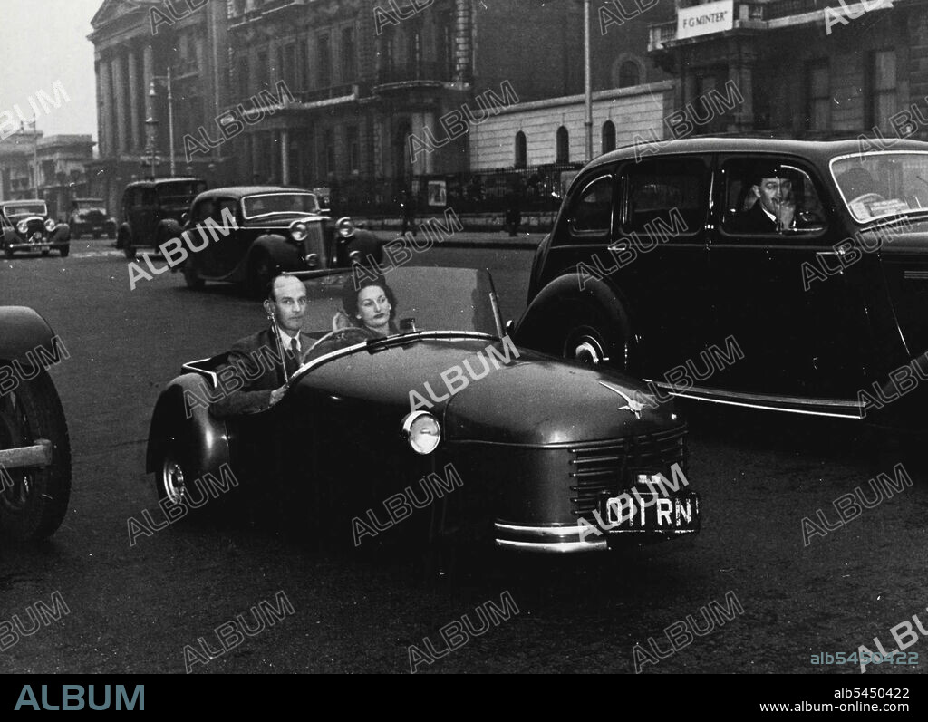 A three wheeler £155 Bond Minicar which makers claim to be the world's smallest, cheapest, most economical family car, is now being made at the rate of 10 a week in Preston, Lancashire, England. April 26, 1949.