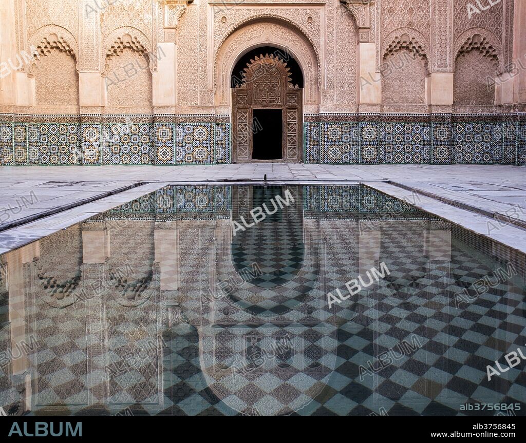 Reflections in the courtyard pool, Medersa Ali Ben Youssef (Madrasa Bin Yousuf), Medina, UNESCO World Heritage Site, Marrakech, Morocco, North Africa, Africa.