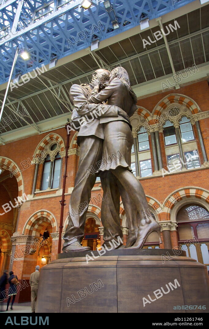 The Meeting Place bronze statue, St. Pancras Railway Station, London, England, United Kingdom, Europe.